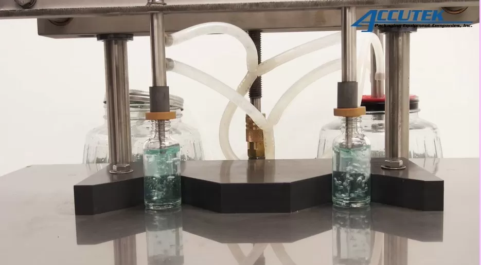 Semi-Automatic Vacuum Filling Machines - Semi-Automatic Vacuum Filling Machine - Accutek Packaging Equipment Companies